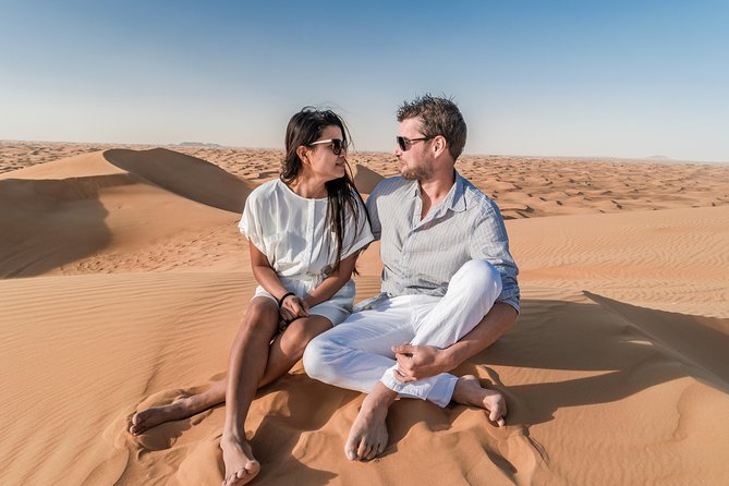 Dubai Desert Discovery: Red Dunes Safari, Sandboard & Camel Ride - Red dunes beyond Dubai’s city towers