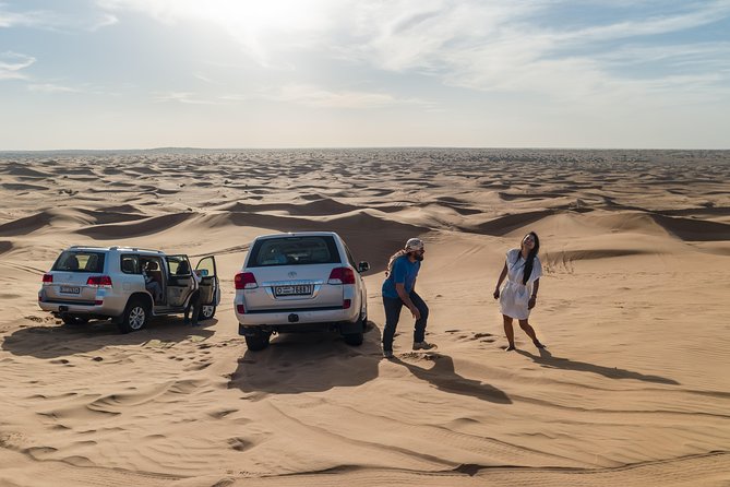 Dubai Desert Discovery: Red Dunes Safari, Sandboard & Camel Ride - Optional quad biking for a separate charge