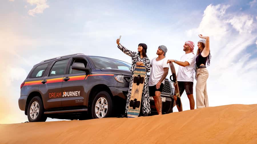 Dubai Desert Safari - Camel Ride, Sandboarding & 30 Min Quad - Red dunes instead of a long desert camp day