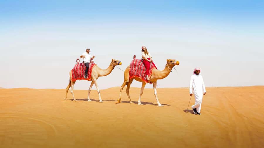 Dubai: Desert Safari, Camel Ride, Sandboarding, Quad Bike - Sandboarding on the Red Dunes