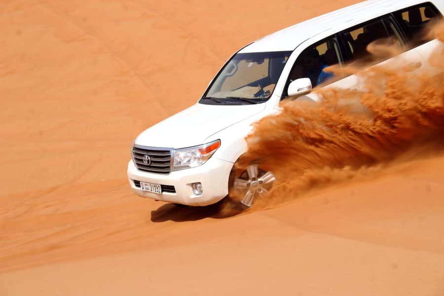 Dubai: Desert Safari, Camel Ride, Sandboarding, Quad Bike - How the price compares with the day
