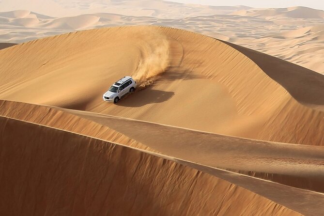 Dubai Desert Safari- Experience The Thrill in The Desert - Leaving Dubai for the red dunes near Lahbab