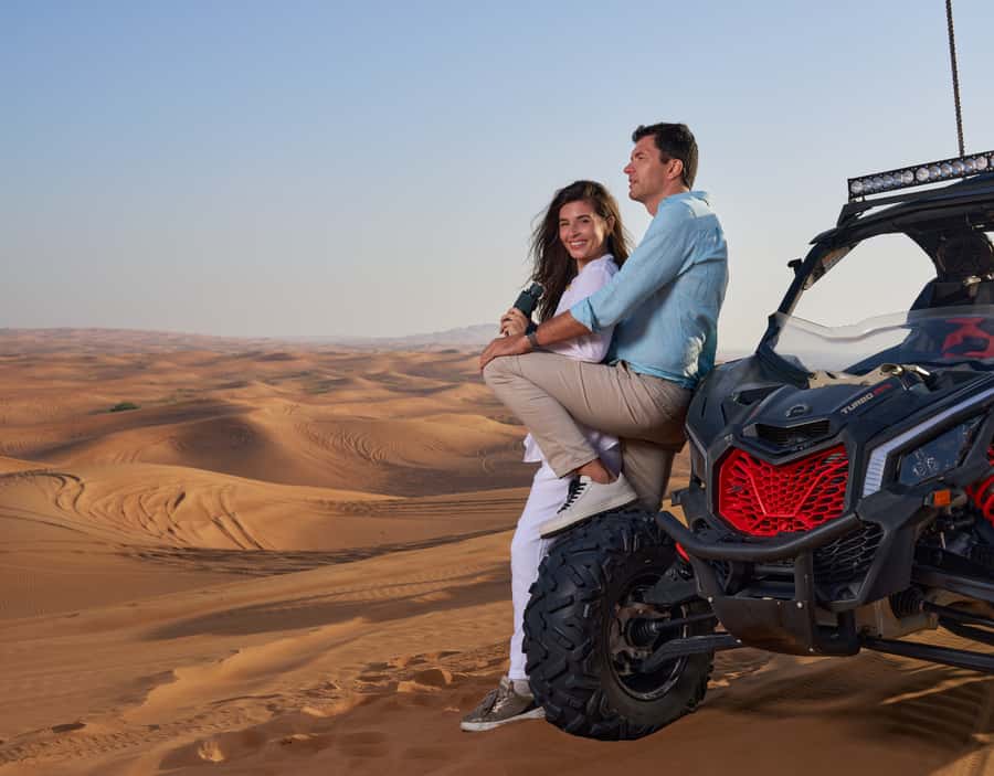 Dubai: Desert Safari, Quad Bike & Premium Camp Experience - From Dubai hotel pickup to the red dunes