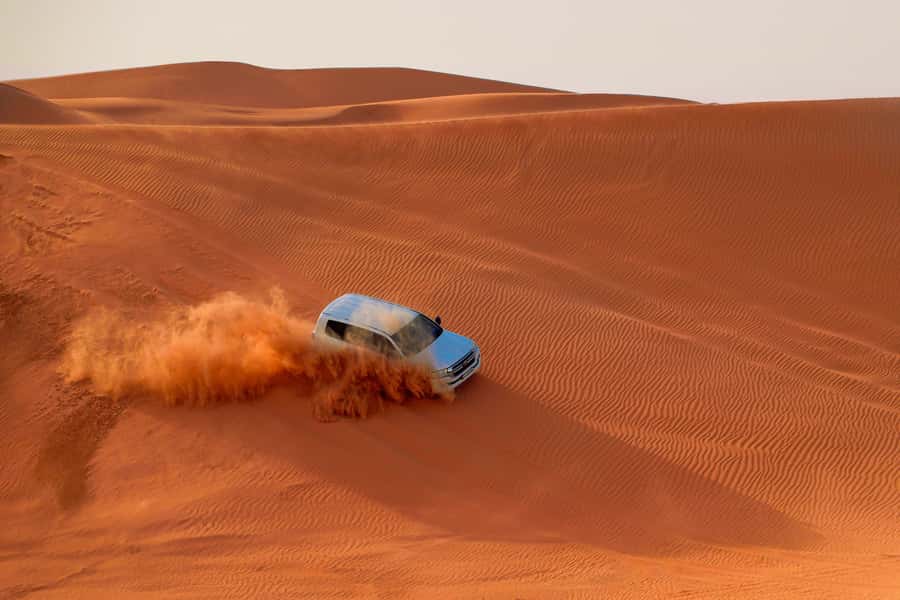 Dubai: Desert Safari, Quad Bike, Sandboarding, Camels & BBQ - Key points at a glance