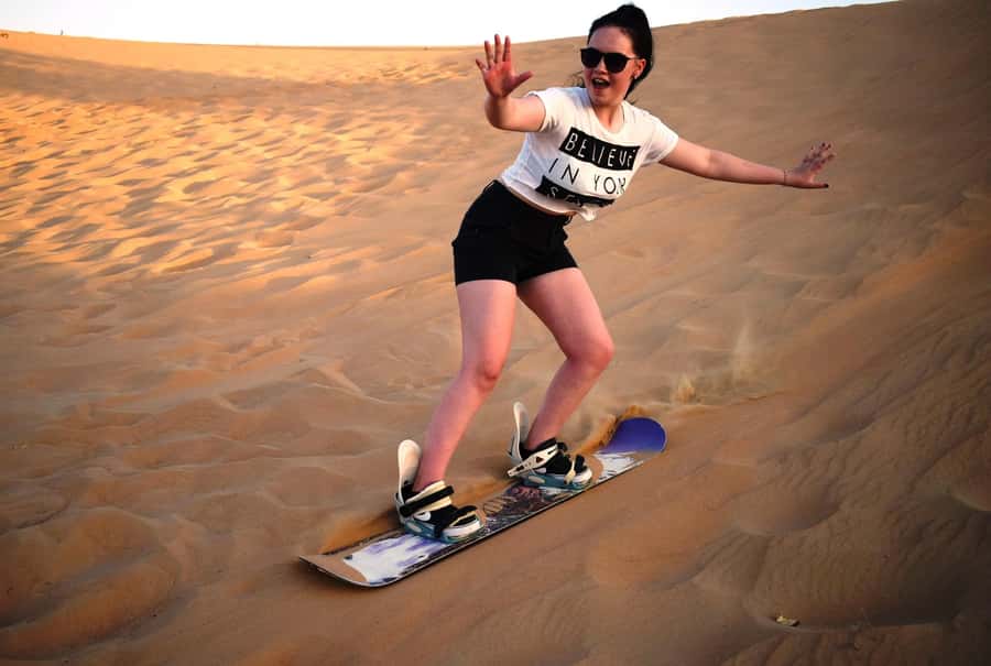 Dubai Desert Safari, Quad Biking, Camel Ride, & Sandboarding - BBQ dinner and a full evening of shows