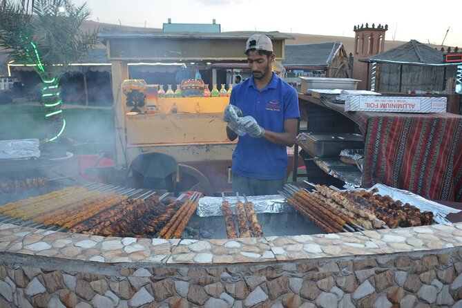 Dubai Desert safari Tour with Live BBQ & Belly Dance Shows - BBQ dinner, refreshments, and optional drinks