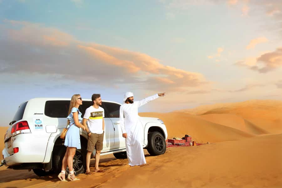 Dubai: Desert Safari with BBQ Dinner & Quad Biking Option - Guides, transfers, and the human side of the outing