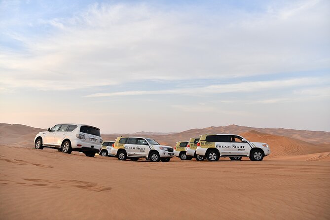 Dubai Desert Safari With Dune Bashing, Camel Ride & BBQ Dinner - Belly dance, tanoura, and fire shows
