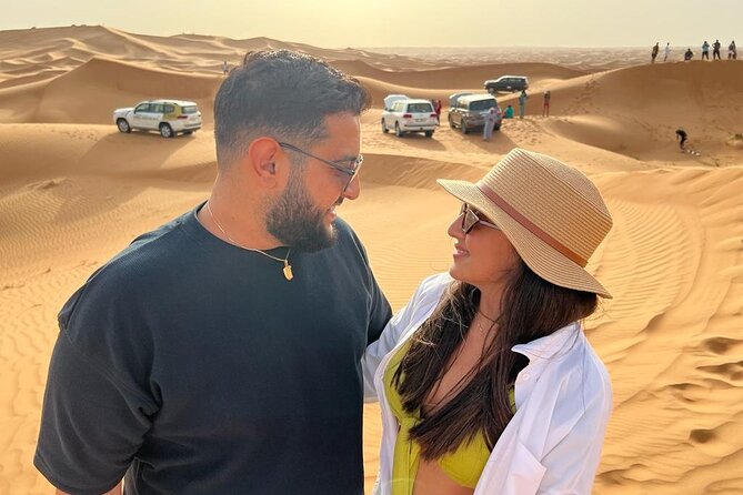 Dubai Desert Safari with Quad Bike, Camel Ride, Dinner and Show - Dune bashing with a driver who sets the tone