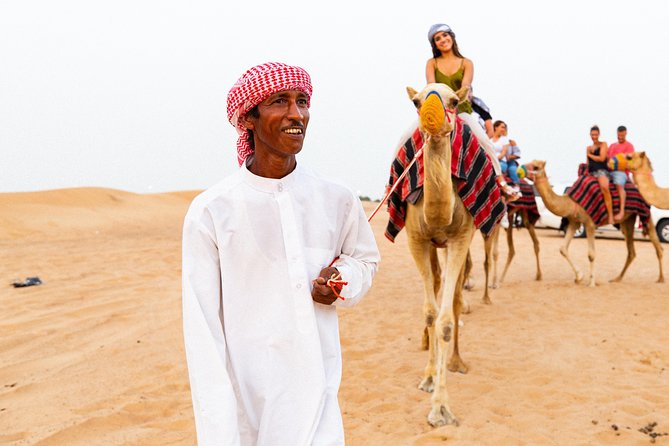 Dubai Desert Safari with Quads, BBQ Dinner, Camel ride, & Shows - From Dubai streets to the open dunes