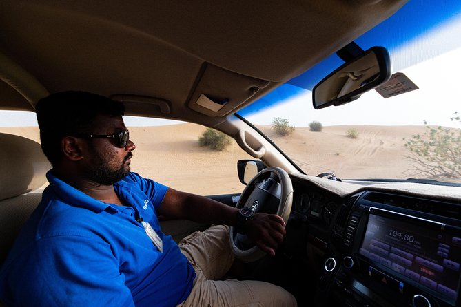 Dubai Desert Safari with Quads, BBQ Dinner, Camel ride, & Shows - The dune bash is the main thrill
