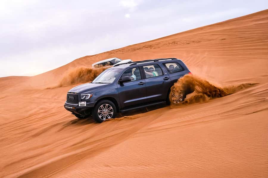 Dubai: Desert Safari with VIP BBQ and Optional Quad Bike - From Dubai’s hotel streets to Al Lahbab’s red dunes
