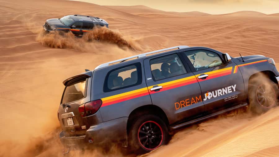 Dubai Desert Trail: Guided Quad/Polaris and Red Dunes Safari - From Dubai towers to Lahbab’s Red Dunes