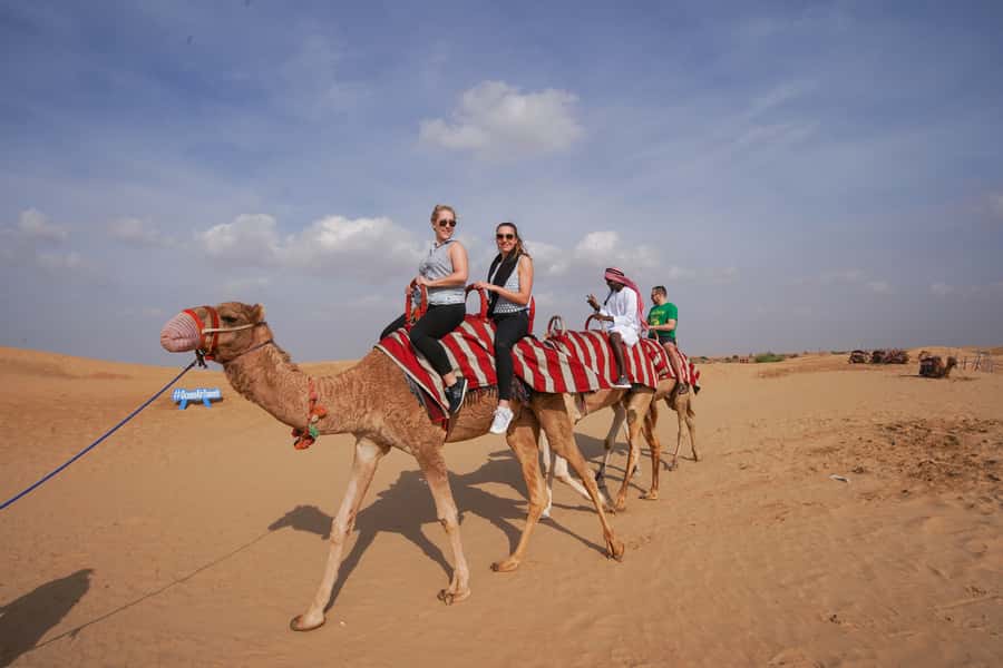 Dubai: Dune Buggy Desert Safari, Camel Ride & Sandboarding - From your Dubai hotel to the red dunes