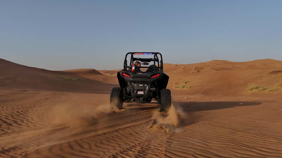 Dubai: Dune Buggy Safari and Camel Ride with Transportation - Sandboarding is a fun but short extra