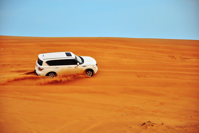 Dubai Evening 4x4 Desert Safari ATV Bike ,Camel Ride , BBQ Dinner - Sunset Photos and a Traditional Welcome