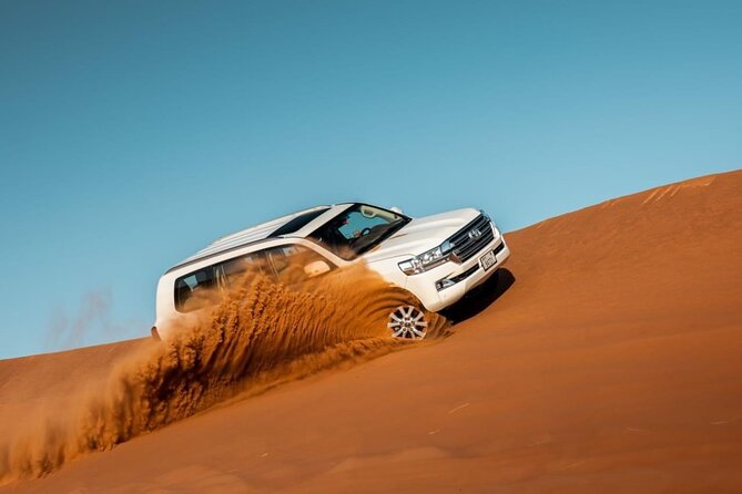 Dubai Evening Desert Safari & BBQ Dinner - Sandboarding and red-dune photo stops