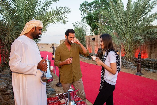 Dubai Evening Desert Safari: Sandboarding, BBQ, Camel Ride & more - Dinner under the stars