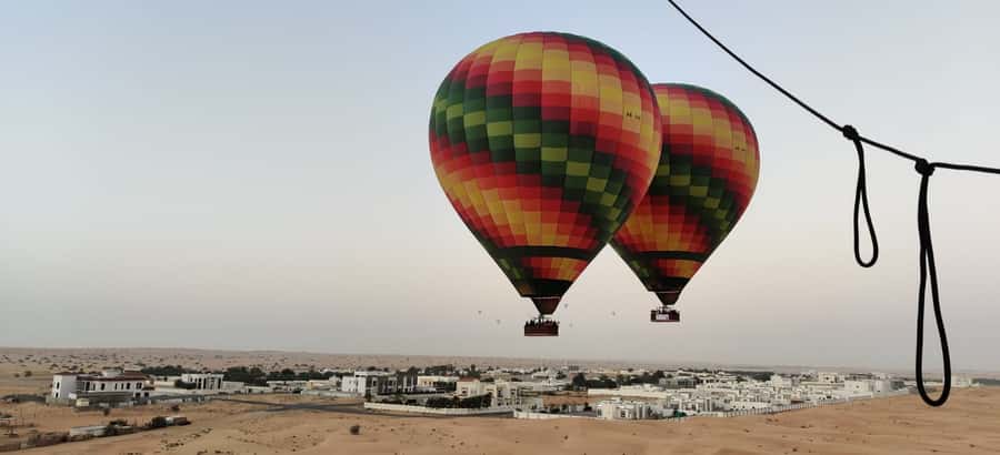 Dubai: Hot Air Balloon, Camel Ride, Desert Safari & More - Camel riding and falconry photos