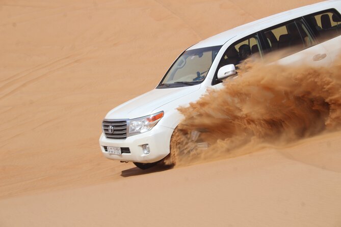 Dubai: Jeep Desert Safari, Camel Ride, and Quad Bike Tour - Sandboarding and the best photo pause