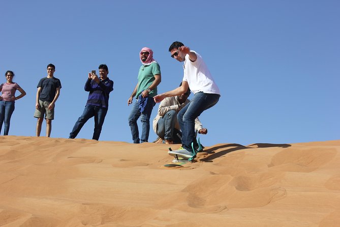 Dubai: Jeep Desert Safari, Camel Ride, and Quad Bike Tour - Al Aweer Camp, BBQ, and entertainment