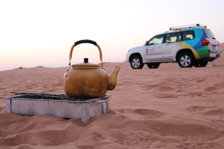 Dubai: Morning Desert Safari with Camel Ride & Sandboarding - Leaving Dubai for the Lahbab Desert