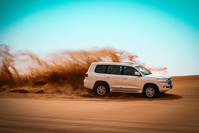 Dubai Morning Evening Desert Safari,Sand boarding and Camel ride - Dune bashing on the high red dunes
