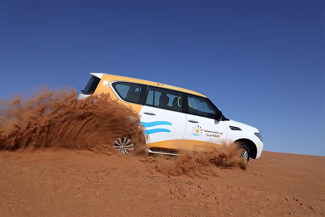 Dubai Premium Desert Safari with Live shows & Gourmet Dinner - Sunset photographs with a helpful driver