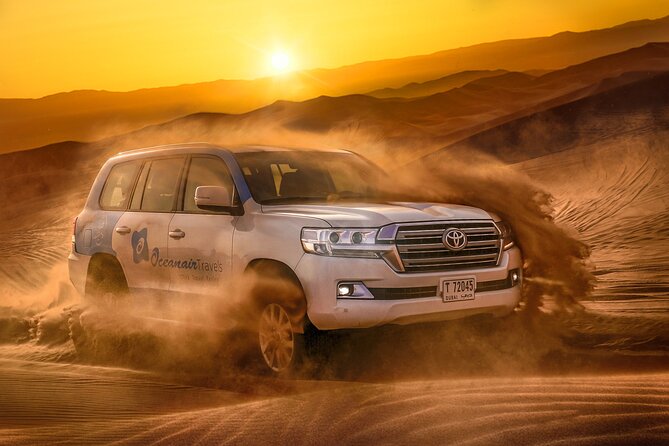 Dubai Premium Red Dunes Safari, Camels & 5<em> BBQ at Al Khayma camp – Why Lahbab’s red dunes make a better setting’ /></p>
<p><p>Dubai’s closer desert tours can be convenient, but Lahbab gives this outing its visual punch. The dunes here are known for their red color, and that warm shade shows up beautifully in sunset photographs. You get a more dramatic backdrop for the sports and camel caravan than you would from a quick stop near the city.</p>
</p>
<p><p>The drive from Dubai takes about 60 minutes in a 4WD. Your English-speaking licensed driver handles the trip and often provides commentary about Dubai, its buildings, palaces, and rapid growth. Rashid Mir, Yusir, Sunil, Abid Wahid, Shams, Sarg, and Tofeeq Abbas are among the guides praised for being informative, funny, organized, or attentive.</p>
</p>
<p><p>Pickup is offered from Dubai, Sharjah, and Ajman, along with selected locations. The exact pickup can fall within 45 minutes before your chosen departure time, so keep your phone available and wait in the hotel lobby. Shared transport keeps the price reasonable, but it also means the day follows a set schedule rather than your own timetable.</p>
</p>
<div class="twil" style="margin: 20px 0; padding: 15px 0;"><p>More Camel Ride Safaris in Dubai</p><ul style="margin: 10px 0; padding-left: 0; list-style: none;"><li style="margin: 0 0 12px 0; padding: 0 0 12px 0; border-bottom: 1px solid #FFF9E4; line-height: 1.4;"><a href="https://thesafaritourguide.com/dubai-desert-safari-quad-bike-camel-ride-al-khayma-camp/">Dubai: Desert Safari, Quad Bike, Camel Ride & Al Khayma Camp</a><br><span style="font-size: 0.82em; color: #555;"><span style="color: #FFD23F;">★</span> 4.9 &nbsp;&middot;&nbsp; 68,962 reviews</span></li><li style="margin: 0 0 12px 0; padding: 0 0 12px 0; border-bottom: 1px solid #FFF9E4; line-height: 1.4;"><a href="https://thesafaritourguide.com/dubai-desert-safari-quad-bike-camel-ride-and-sandboarding/">Dubai: Desert Safari, Quad Bike, Camel Ride and Sandboarding</a><br><span style="font-size: 0.82em; color: #555;"><span style="color: #FFD23F;">★</span> 4.9 &nbsp;&middot;&nbsp; 43,505 reviews</span></li><li style="margin: 0; padding: 0; border-bottom: none; line-height: 1.4;"><a href="https://thesafaritourguide.com/dubai-safari-quad-bike-camel-ride-and-buffet-dinner/">Dubai: Safari, Quad Bike, Camel Ride, and Buffet Dinner</a><br><span style="font-size: 0.82em; color: #555;"><span style="color: #FFD23F;">★</span> 4.9 &nbsp;&middot;&nbsp; 33,424 reviews</span></li></ul></div><h2>The 4WD ride and Lahbab dune bashing</h2>
<p><img width="669" height="446" decoding="async" src=
