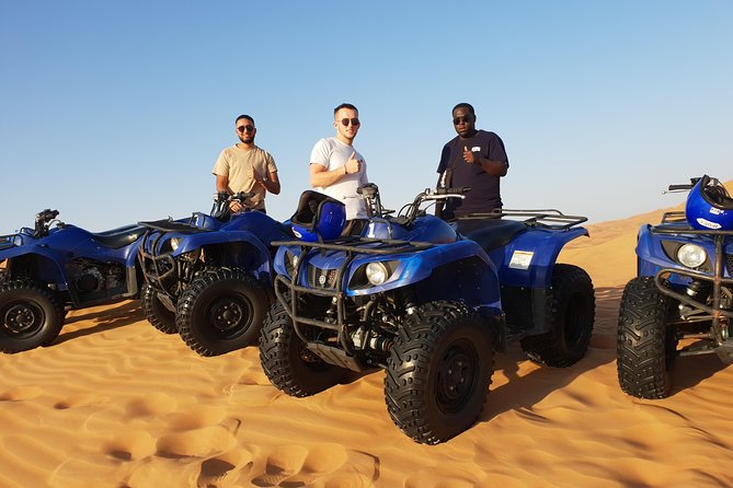 Dubai: Quad Bike Safari, Camels, & Camp with BBQ Dinner - Sandboarding and the red-dune photo stop
