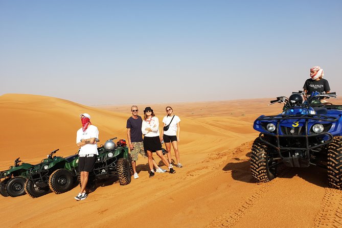 Dubai: Quad Bike Safari, Camels, & Camp with BBQ Dinner - Sunset at the Bedouin-style camp