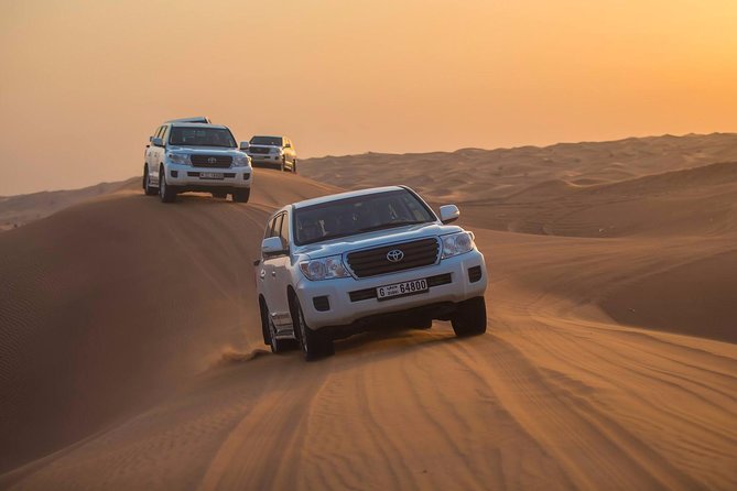 Dubai Red Dunes Desert Safari : Sandboarding, BBQ & Live Shows - Lahbab’s red dunes and the 4x4 ride