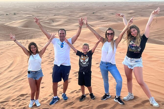 Dubai Red Dunes Safari, ATV, Camel ride, BBQ at Desert Camp - Belly dance, Tanoura, and fire performances