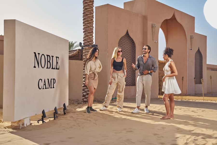 Dubai’s Best Desert Safari: Live Show & Gourmet BBQ Dinner - Camels, henna, falcons, and low-key camp activities