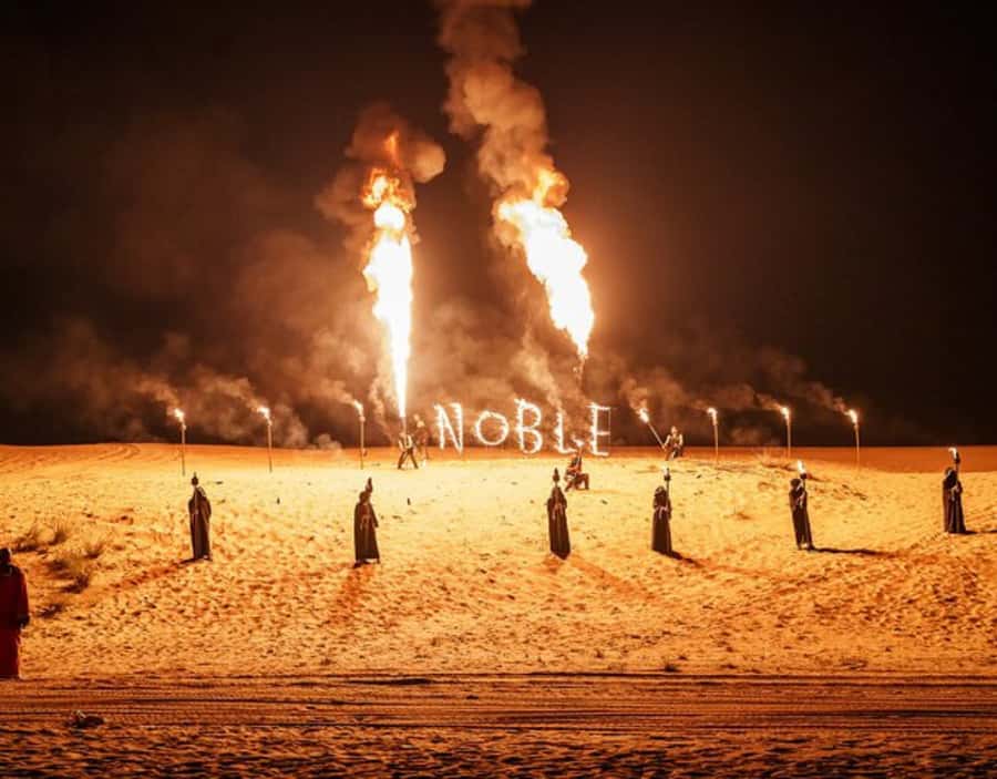Dubai’s Best Desert Safari: Live Show & Gourmet BBQ Dinner - Sandboarding and the first desert photo stop