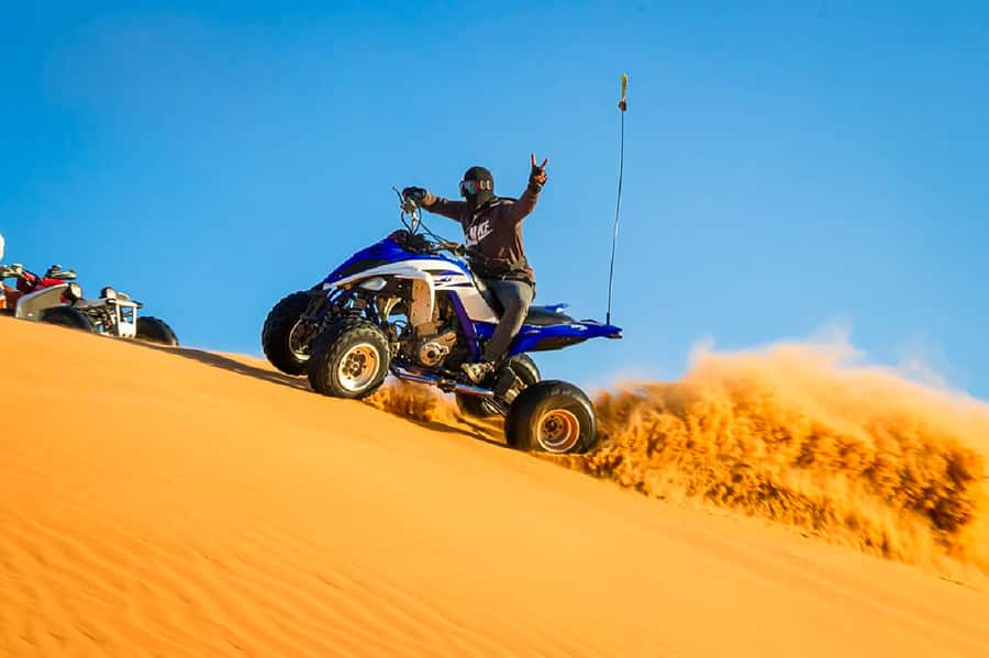 Dubai: Safari, Quad Bike, Camel Ride, and Buffet Dinner - Choosing between quad biking and dune bashing