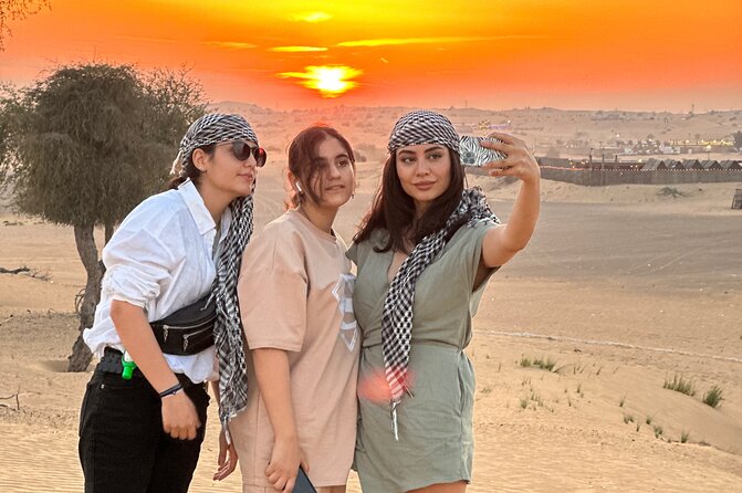 Dubai Sunset Red Dune Desert Safari, Sandboarding and Camel Ride - Pickup from Dubai and the four-hour schedule