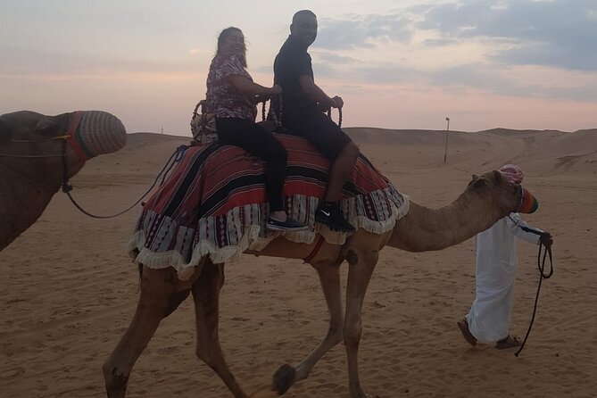Dubai: Unique SUNSET 4WD Red Dunes Safari - Folkloric and belly dance shows under the stars