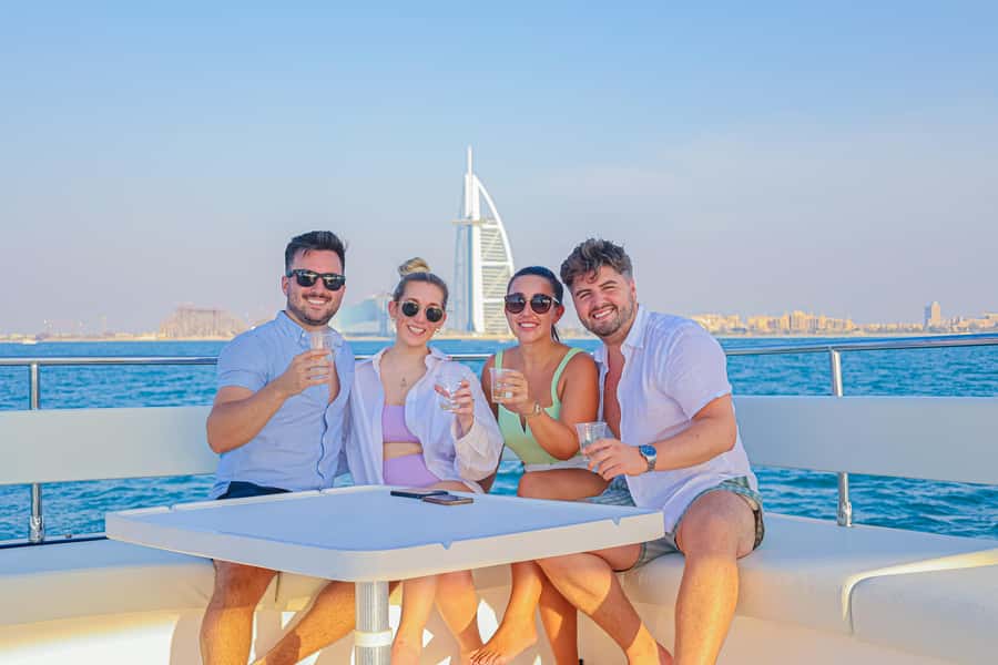 Dubai Waves & Dunes: Luxury Yacht Cruise w/ Red Dunes Safari - Sandboarding and a short camel ride