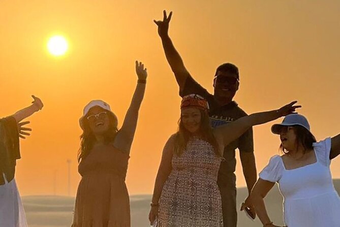 Evening Desert Safari Abu Dhabi with Hot BBQ Dinner - Camel farm, camel ride, and sandboarding