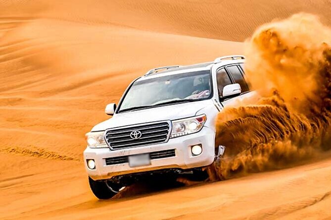 Evening Desert Safari Dubai with Camel Riding & BBQ Buffet Dinner - Dune bashing is the day’s main thrill