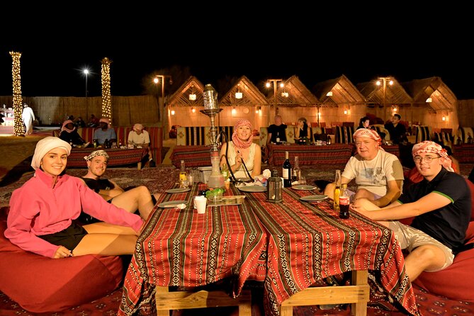 Evening Desert Safari in Dubai, Sandboard & BBQ Dinner - Sandboarding, with one useful caution