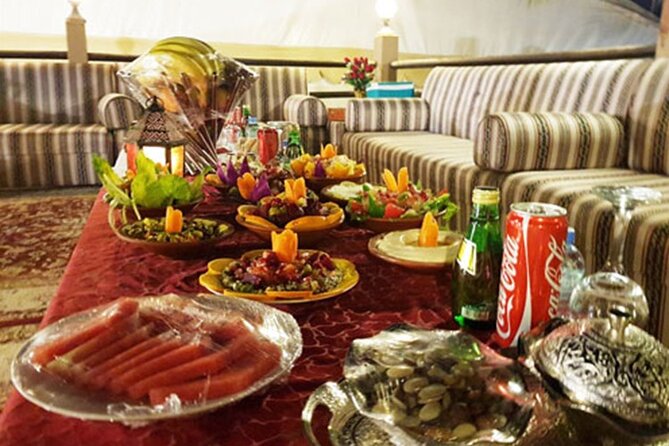 Evening desert safari with camel ride and BBQ dinner - Dune bashing across Lahbab’s red sand