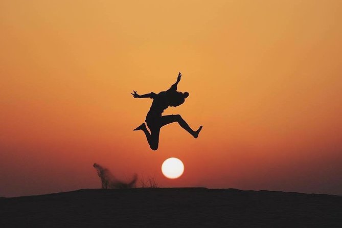 Evening Dubai Safari with BBQ, Dance Shows & Quad Biking optional - A short camel ride before the camp