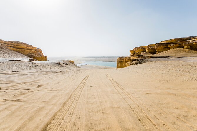 From Cairo: Desert Safari, Waterfalls, Sand boarding and Camel ride with Lunch - Camel riding is short but memorable