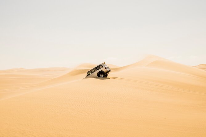From Cairo: Desert Safari, Waterfalls, Sand boarding and Camel ride with Lunch - Waterfalls beside desert lakes