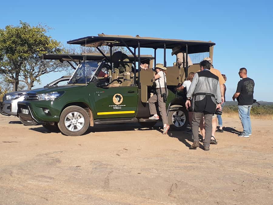 From Malelane: Half Day Kruger Park Wildlife Safari - Entering Kruger in an open safari vehicle