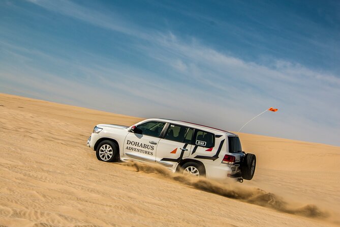 Full-day Qatar desert safari: dune bashing, sandboarding, camels - Five hours at Al Majles Resort