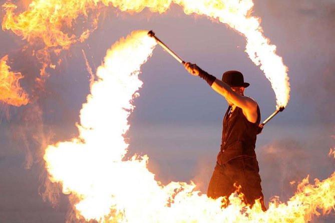 Half-Day Dubai Desert Safari With 7 Live Shows and BBQ Dinner - Sunset over the red dunes