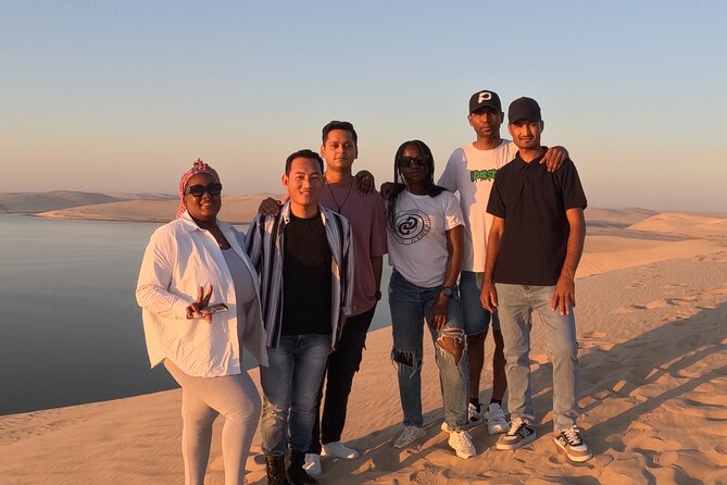Half Day Safari Tour With Camel Ride and Sand Boarding in Doha - Sandboarding on Qatar’s dunes